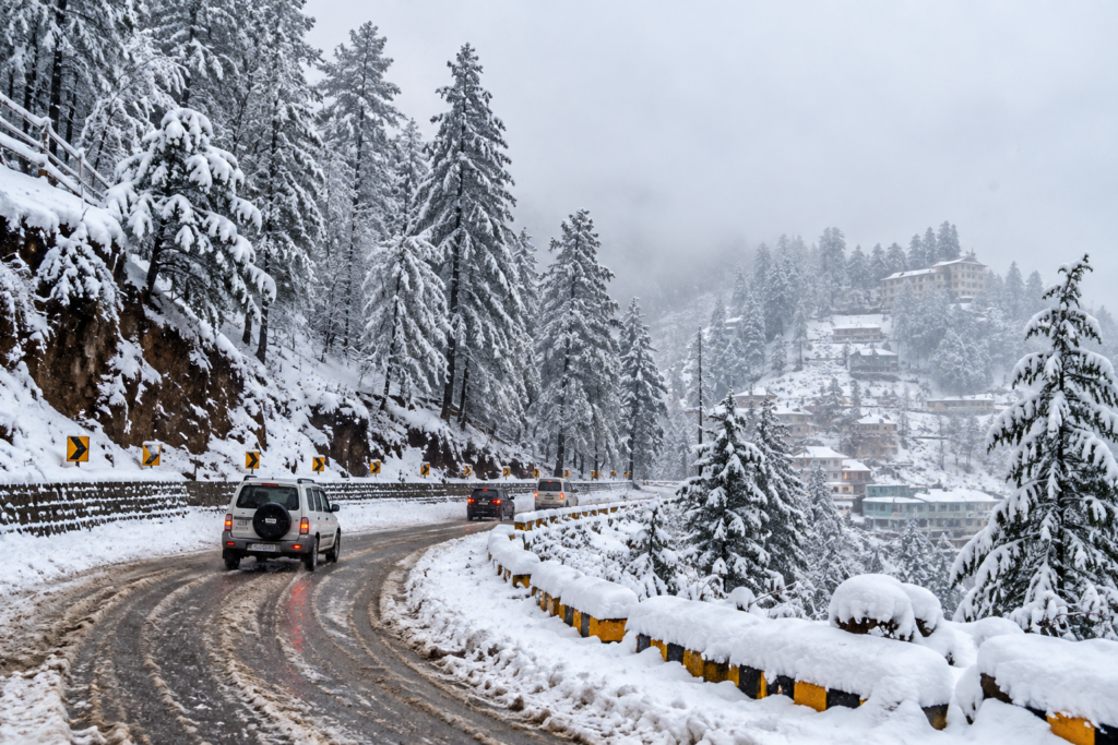 AI illustration of vehicles traveling along a snow-covered mountain road with poor visibility